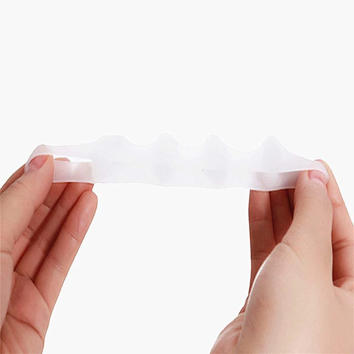 Tenenspreider (2 Stuks) - Voor Alle Tenen - Correctie - Hamertenen - Hallux Valgus - Pijnvermindering - Per Paar - Tenenspreiders - Zacht, Flexibel En Hygiënisch - Siliconengel - One Size 5 Tenenspreider (2 Stuks) - Voor Alle Tenen - Correctie - Hamertenen - Hallux Valgus - Pijnvermindering - Per Paar - Tenenspreiders - Zacht, Flexibel En Hygiënisch - Siliconengel - One Size - Afbeelding 3