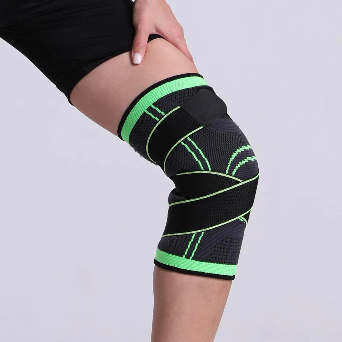 Knie Brace - Knie Ondersteuning - Knee Wraps - Kniebrace - Kniebandage Ondersteuning - Knie Bandage - Knie Steun - Zwart/ Groen - Maat L - Able & Borret 5 Knie Brace - Knie Ondersteuning - Knee Wraps - Kniebrace - Kniebandage Ondersteuning - Knie Bandage - Knie Steun - Zwart/ Groen - Maat L - Able & Borret - Afbeelding 3