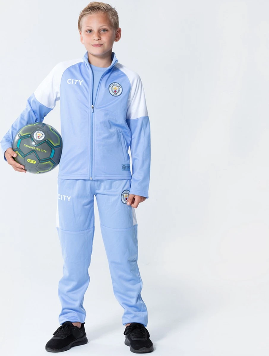 Manchester City Trainingspak 21/22 - Sportkleding Voor Kinderen - Officieel Manchester City Fanproduct - Man City Vest En Trainingsbroek - Maat 152 4 Manchester City Trainingspak 21/22 - Sportkleding Voor Kinderen - Officieel Manchester City Fanproduct - Man City Vest En Trainingsbroek - Maat 152 - Afbeelding 2